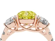 Fancy Yellow Cushion Cut Diamond Three-Stone Ring Set in Rose gold with Pavé Band