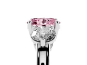 Fancy Pink Oval Cut Diamond Three-Stone Ring Set in Platinum with Prong Setting and Classic Band