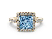 Fancy Blue Princess Cut Diamond Halo Pavé Solitaire Ring Set in Yellow gold with Prong-Set Center Stone