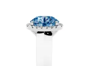 Fancy Blue Round Cut Diamond Halo Ring Set in White gold with Cathedral Band and Prong Setting