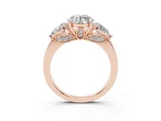 Round Cut Diamond Three-Stone Ring Set in Rose gold with Pear Side Stones