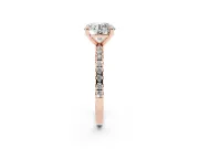 Round Cut Diamond Brilliant Solitaire Ring Set in Rose gold with Pavé Band and Prong Setting