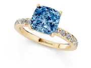 Fancy Blue Cushion Cut Diamond Solitaire Set in Yellow gold with Round Pavé Band and Prong Setting