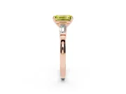 Fancy Yellow Emerald Cut Diamond Solitaire Ring Set in Rose gold with Tapered Baguette Accents and Prong Setting