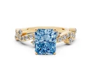 Fancy Blue Radiant Cut Diamond Solitaire Twisted Band Set in Yellow gold with Pavé Setting