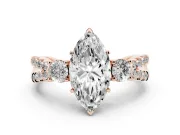 Marquise Cut Diamond Three-Stone Ring Set in Rose gold with Pavé Split Shank and Prong Setting