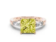 Fancy Yellow Princess Cut Diamond Solitaire Ring Set in Rose gold with Tapered Baguette Side Stones and Prong Setting