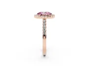 Fancy Pink Oval Cut Diamond Halo Pavé Solitaire Ring Set in Rose gold with Prong-Set Center Stone