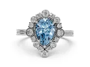 Fancy Blue Pear Cut Diamond Halo Milgrain Pavé Ring Set in Platinum with Prong Setting