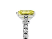 Fancy Yellow Emerald Cut Diamond Solitaire Engagement Ring Set in Platinum with Delicate Pavé Band and Prong Setting
