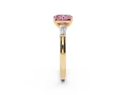 Fancy Pink Radiant Cut Diamond Solitaire Ring Set in Yellow gold with Tapered Baguette Side Stones and Prong Setting