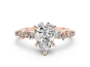 Pear Cut Diamond Solitaire Vine Band Ring Set in Rose gold with Round Accents and Prong Setting