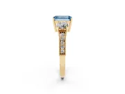 Emerald Cut Three Stone Engagement Ring Setting for a Fancy Blue Lab-Grown Diamond | Graduated Pave Band | Yellow Gold