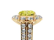 Fancy Yellow Radiant Cut Diamond Halo Engagement Ring Set in Yellow gold with Split Shank and Prong Setting