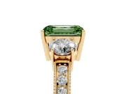 Fancy Green Emerald Cut Diamond Three-Stone Ring Set in Yellow gold with Round Side Stones and Pavé Band