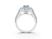 Fancy Blue Oval Cut Diamond Halo Engagement Ring Set in Silver with Split Shank and Prong Setting