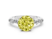 Fancy Yellow Round Cut Diamond Cluster Solitaire Ring Set in White gold with Prong Setting