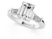 Emerald Cut Diamond Solitaire Ring Set in Platinum with Tapered Baguette Accents and Prong Setting