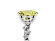 Fancy Yellow Oval Cut Diamond Solitaire Vine Band Ring Set in White gold with Round Accents and Prong Setting