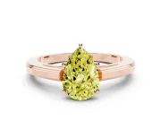 Fancy Yellow Pear Cut Diamond Solitaire Ring Set in Rose gold with Prong Setting and Classic Band