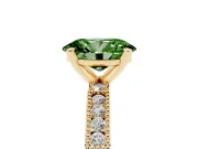Fancy Green Oval Cut Diamond Solitaire Ring Set in Yellow gold with Slim Pavé Band and Prong Setting