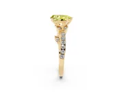 Fancy Yellow Pear Cut Diamond Solitaire Leaf-Inspired Ring Set in Yellow gold with Pavé Band and Prong Setting