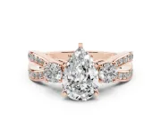 Three-Stone Pear Cut Diamond Twist Band Ring Set in Rose gold with Pavé Accents and Prong Setting