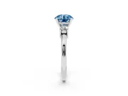 Fancy Blue Three-Stone Round Cut Diamond Ring Set in White gold with Prong Setting and Plain Band