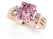 Fancy Pink Three-Stone Radiant Cut Diamond Channel Set Ring Set in Rose gold with Bar Prongs