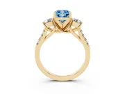 Fancy Blue Three-Stone Cushion Cut Diamond Pavé Band Ring Set in Yellow gold with Prong-Set Trio
