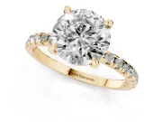 Round Cut Diamond Brilliant Solitaire Ring Set in Yellow gold with Pavé Band and Prong Setting