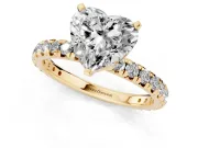 Heart Cut Diamond Pavé Solitaire Ring Set in Yellow gold with Round Band and Prong Setting