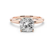 Cushion Cut Diamond Solitaire Engagement Ring Set in Rose gold with Prong Setting and Polished Band