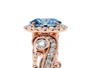 Fancy Blue Oval Cut Diamond Halo Ring Set in Rose gold with Milgrain Pavé Band and Prong Setting