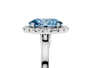 Fancy Blue Oval Cut Halo Round Diamond Solitaire Ring Set in White gold with Pavé Band and Prong Setting