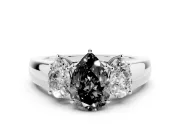 Fancy Black Three-Stone Pear Cut Diamond Ring Set in Platinum with Matching Prong Settings and Plain Band