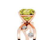 Fancy Yellow Princess Cut Diamond Solitaire Ring Set in Rose gold with Side Stones on Criss-Cross Band and Prong Setting