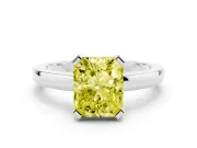 Fancy Yellow Radiant Cut Diamond Solitaire Ring Set in White gold with Prong Head and Smooth Polished Band