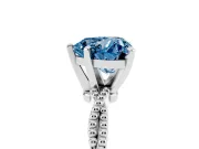Fancy Blue Heart Cut Diamond Solitaire Ring Set in White gold with Twisted Band and Bead Prong Setting