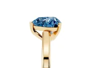 Fancy Blue Heart Cut Diamond Solitaire Ring Set in Yellow gold with Prong Setting and Classic Band