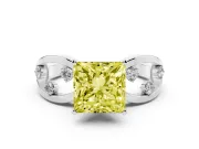 Fancy Yellow Princess Cut Diamond Solitaire Ring Set in Silver with Side Stones on Criss-Cross Band and Prong Setting