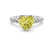 Fancy Yellow Heart Cut Diamond Pavé Solitaire Ring Set in White gold with Round Band and Prong Setting
