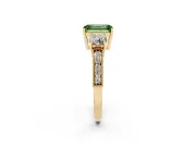 Fancy Green Emerald Cut Diamond Three-Stone Ring Set in Yellow gold with Round Side Stones and Pavé Band