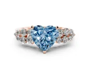 Fancy Blue Heart Cut Diamond Cluster Engagement Ring Set in Rose gold with Pavé Band and Prong Setting