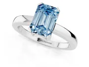 Fancy Blue Emerald Cut Diamond Solitaire Ring Set in Silver with Prong Head and Smooth Polished Band