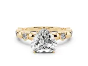 Heart Cut Diamond Solitaire Ring Set in Yellow gold with Bezel-Set Accents on Beaded Band and Prong Setting