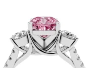 Fancy Pink Three-Stone Cushion Cut Diamond Pavé Band Ring Set in Platinum with Prong-Set Trio