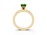 Fancy Green Radiant Cut Diamond Solitaire Ring Set in Yellow gold with Channel-Set Baguette Band and Prong Setting