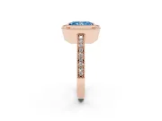 Fancy Blue Radiant Cut Diamond Halo Engagement Ring Set in Rose gold with Pavé Band and Round Halo Stones