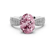 Fancy Pink Oval Cut Diamond Solitaire Ring Set in Platinum with Milgrain Double Row Round Pavé Band